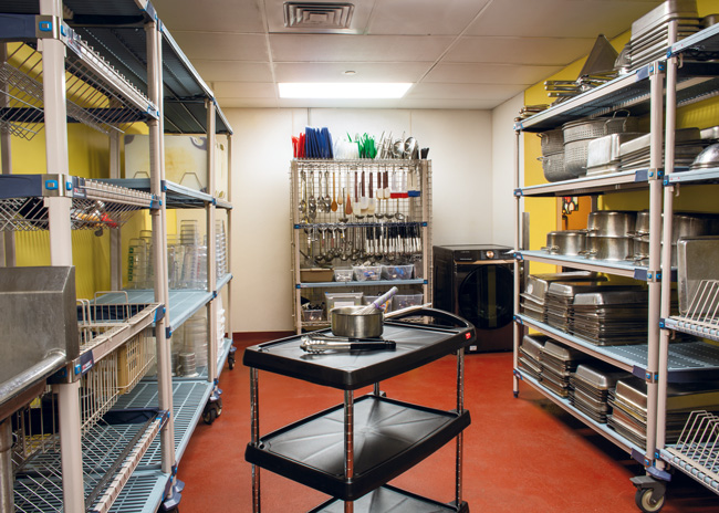 Additional shelving and storage solutions created a more functional dish room.