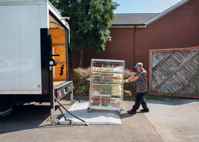 Andrew White, Food4VOLS coordinator, says the new equipment and configuration in the truck makes transporting food much easier. An average of 650 pounds of food are collected each day from locations around campus. Roughly 350 heat-and-eat meals are distributed daily.