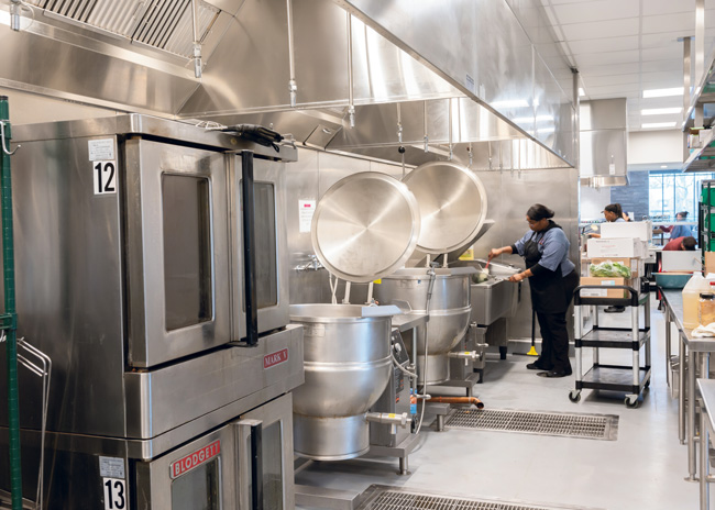 Combi ovens, kettles and a flattop griddle support back-of-the-house production.