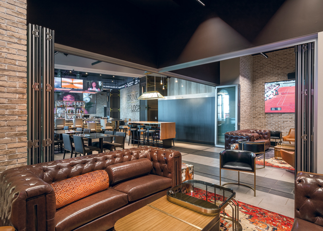 A variety of seating offers choices as guests eat, drink and watch the games at (209) Sports Bar + Kitchen.