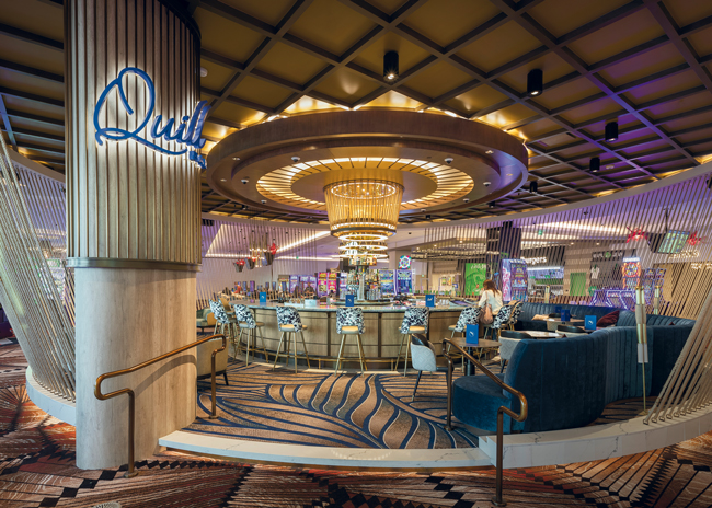 Quill Bar contains a full lineup of equipment, including soda guns, a blender station, a glass washer, a coffee grinder, an espresso machine, coffee and tea brewers, an underbar refrigerator, and a draft beer system.