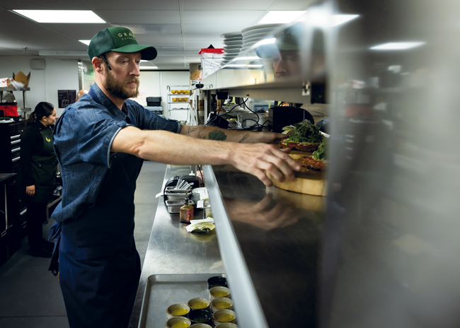 Clockwise from left: The Gravitas menu emphasizes both quality and a range of options, such as the club’s signature scallops (far left) and chicken parmesan. Executive chef Preston Madson designs and executes both the a la carte and private event menus.
