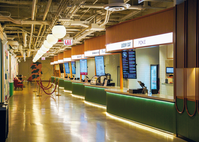 When franchisor and restaurant operator Craveworthy Brands reopened Hayden Hall, the second-floor food hall in the iconic Big Red office building in Chicago, it installed its own small chains rather than local independent concepts; the company utilizes the outlets to test the appeal of new menu items.  Photo courtesy of Craveworthy Brands